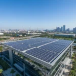 Commercial building with rooftop solar panels under a clear blue sky, symbolizing sustainable energy and commercial solar financing.
