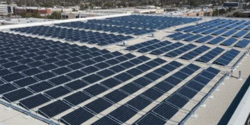 Modern solar panels on a commercial rooftop with advanced mounting systems